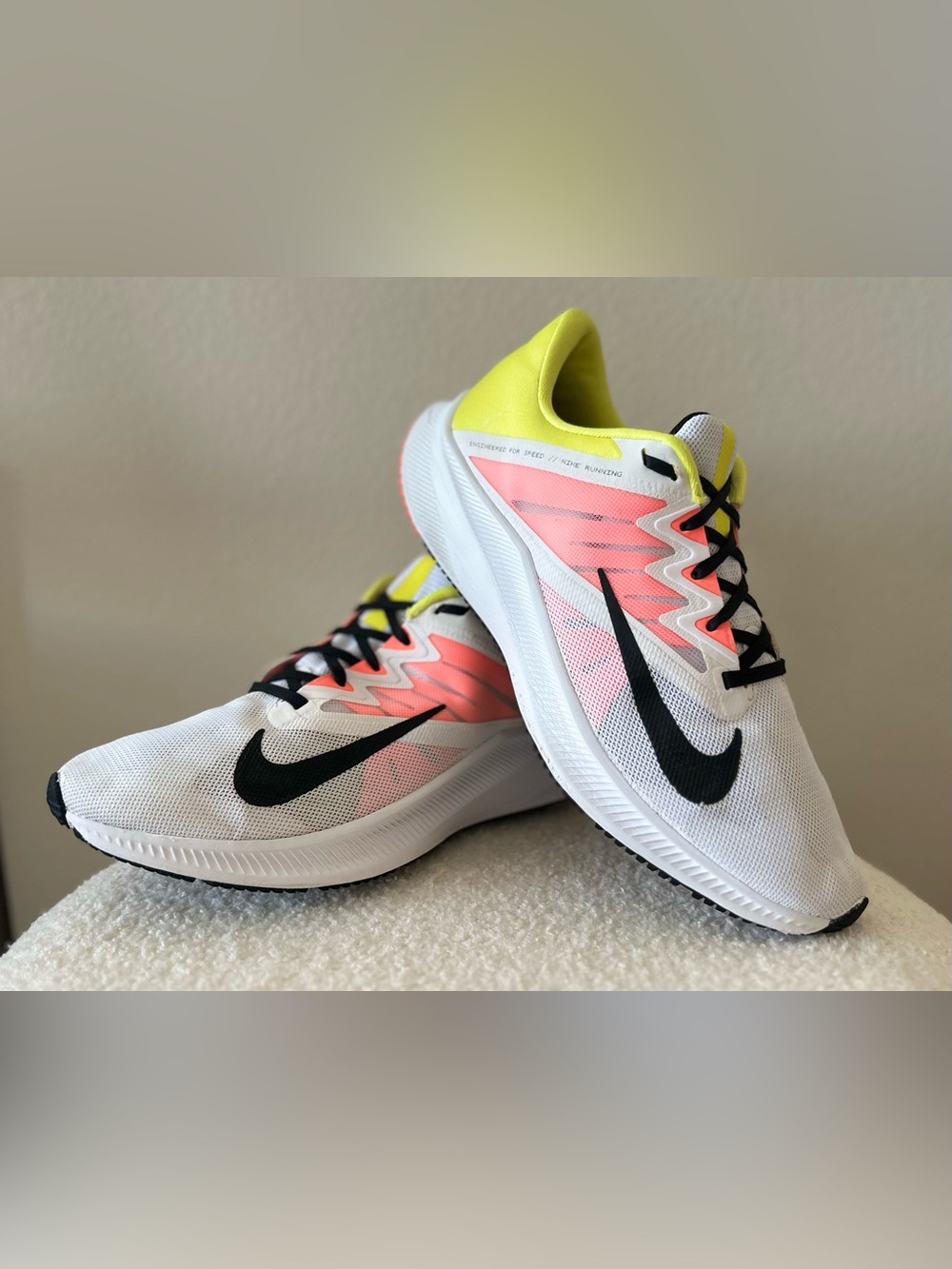Nike Women's Quest 3 in the White/Orange/Volt size 11